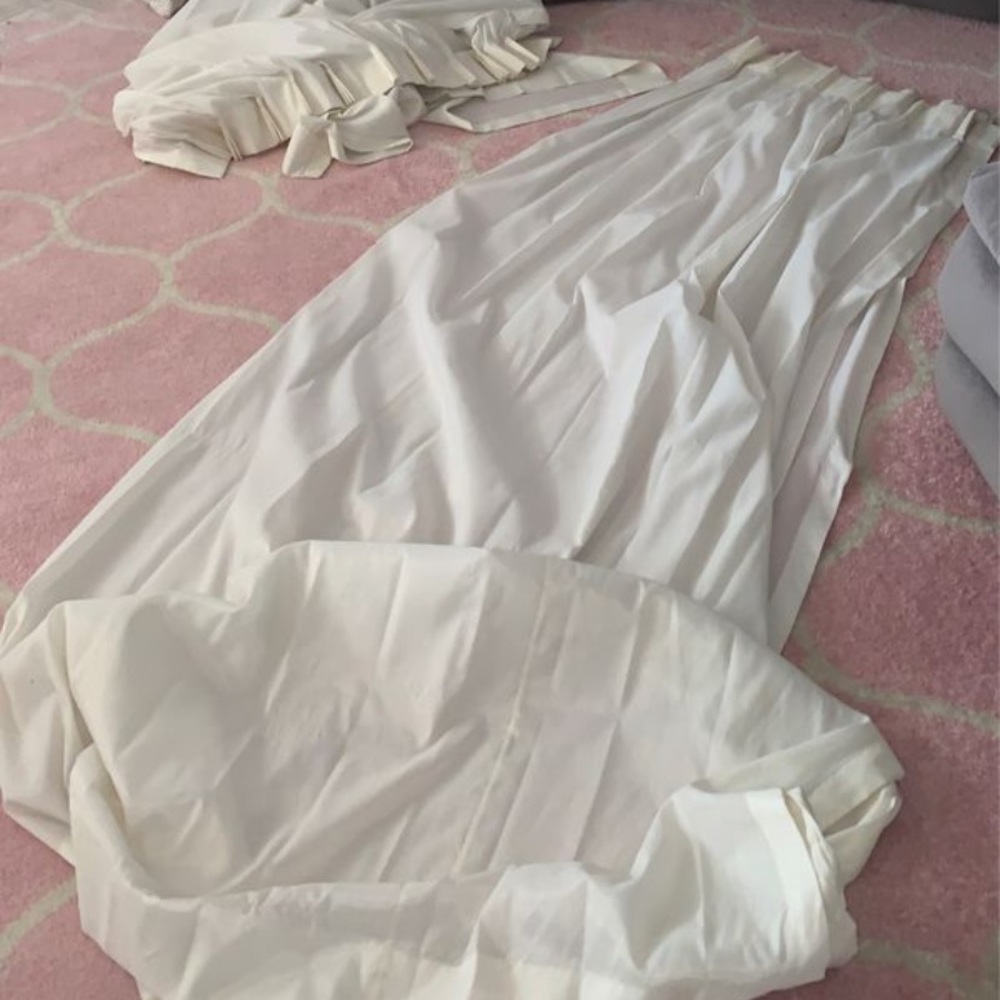2 off white curtains